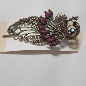 A peacock hair clip